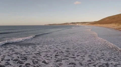 Sunset Beach - Flying backwards Stock Footage 44753638