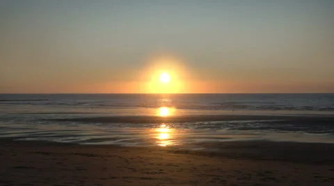 Sunset at the beach Stockbeeldmateriaal 51672367