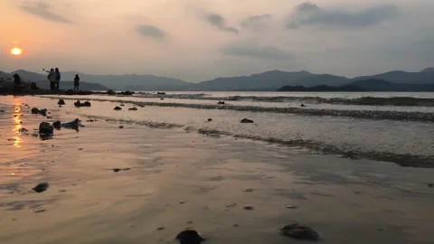 Sunset at a beach 库存影片 144908891