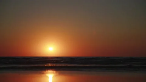 Sunset at the beach Stockbeeldmateriaal 237758258