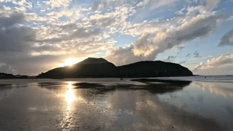 Sunset at the beach Stock Footage 303344874