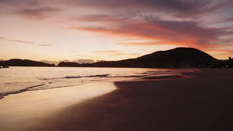 Sunset at the beach Stock Footage 309725360