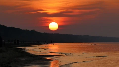 Sunset at beach with gently moving soft wave Vídeo Stock 96519742