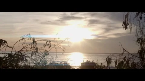 Sunset on Beach - Golden hour sun 4K Video stock 327040751