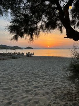 Sunset beach in Greece Stock Photos