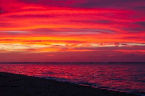 Sunset on the Beach in Hawaii Stock Photos