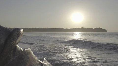 Sunset Beach with a high tide Stock Footage 83063685