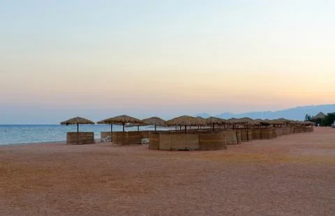 Sunset on the beach of hotel in Egypt Stock Photos