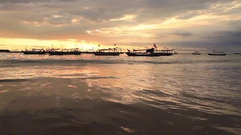 Sunset on the beach of Jimbaran. Bali Stock-Footage 70199622