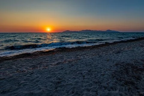 Sunset at the beach in kos Stock Photos