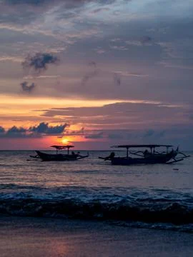 Sunset at the  beach in Kuta Stock Photos