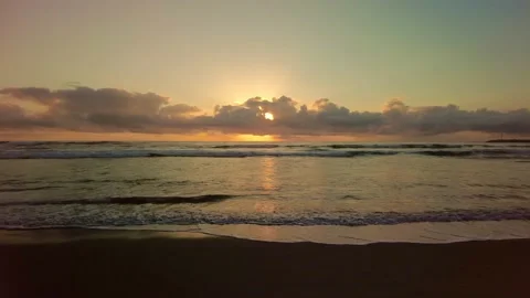 Sunset beach landscape. Atlantic ocean coast. Water surface and colorful sky Stock-Footage 155305683