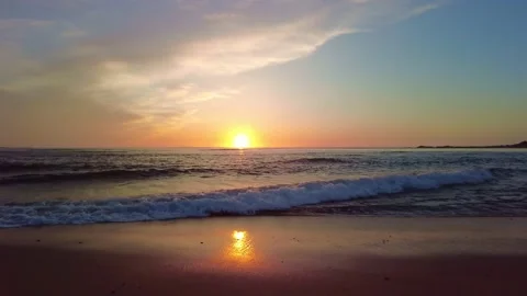 Sunset beach landscape. Summer altantic ocean coast. Waves and orange sky Stock-Footage 152784245