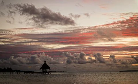 Sunset on the beach in maldives Stock Photos
