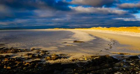 Sunset on a beach in North Uist, Outer Hebrides, Scotland Stock Photos