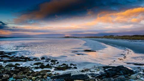 Sunset on a beach in North Uist, Outer Hebrides, Scotland Stock Photos