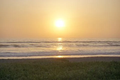 Sunset at the beach with ocean view Stock Photos