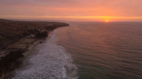 Sunset at a beach with the Pacific Ocean Stock Footage 102633771