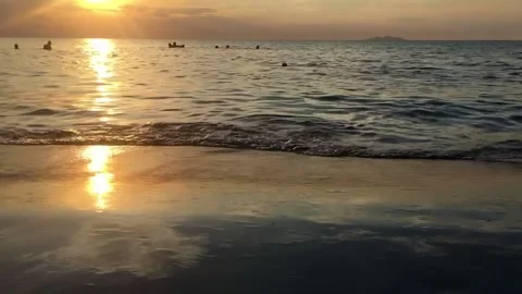 Sunset beach people swimming Stock Footage 161963770