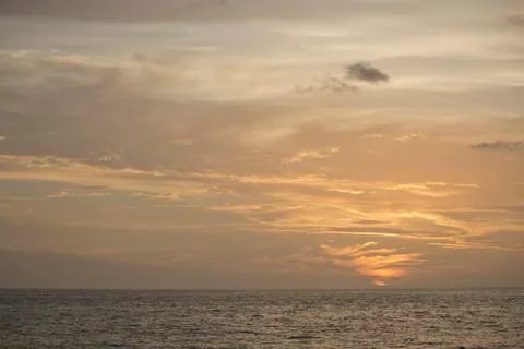 Sunset off the beach Stock Photos