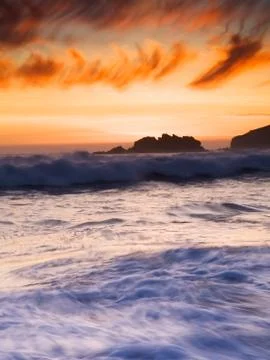 Sunset at the beach Stock Photos