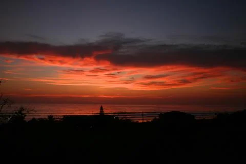 Sunset at the beach Stock Photos