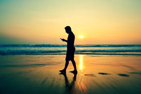 Sunset on the beach Stock Photos