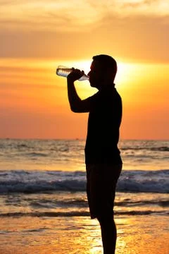 Sunset on the beach Stock Photos