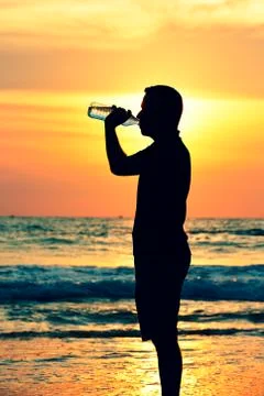 Sunset on the beach Stock Photos