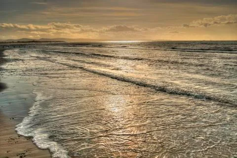 Sunset beach Stock Photos