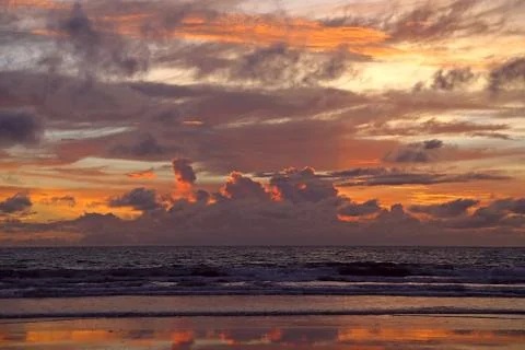 Sunset at the beach Stock Photos