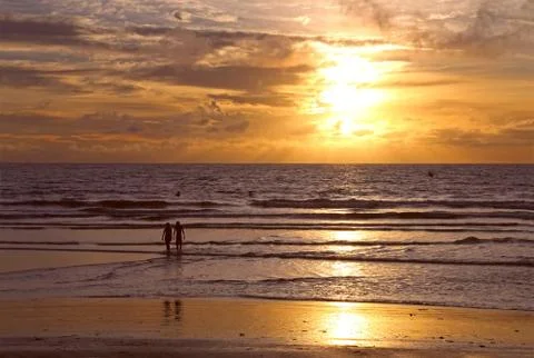 Sunset at the beach Stock Photos