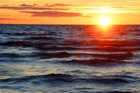 Sunset at the beach Stock Photos