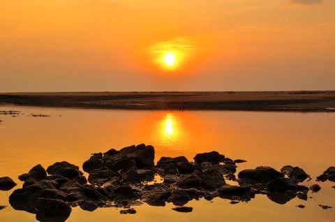 Sunset at the beach Stockfoto's