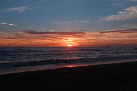 Sunset at the beach Stock Photos