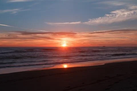 Sunset at the beach Stock Photos