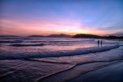 Sunset at the beach Stock Photos