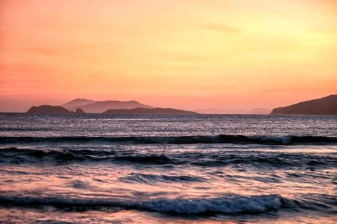 Sunset at the beach Stock Photos