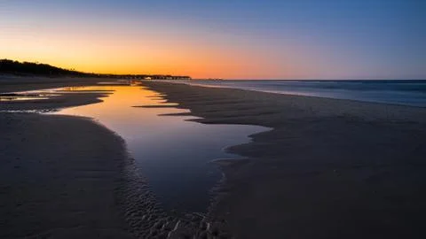 Sunset at the beach Stock Photos