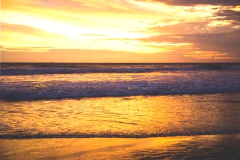 Sunset on the beach Stock Photos