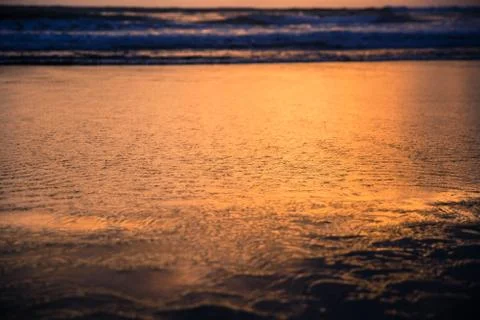 Sunset on the beach Stock Photos