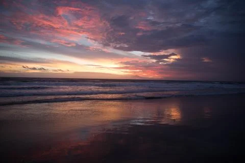 Sunset on the beach Photos