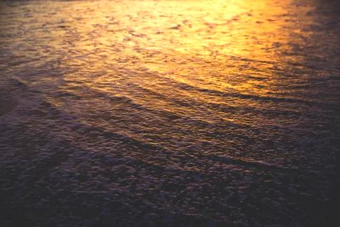 Sunset on the beach Photos