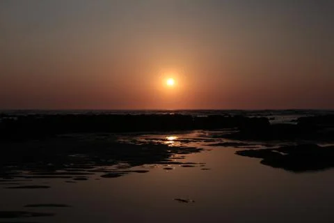Sunset on the beach Stock Photos