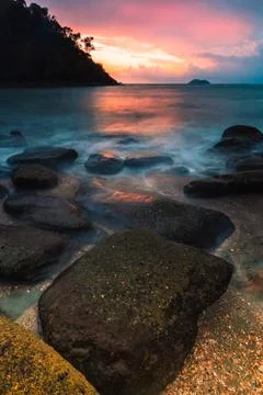 Sunset on the beach Stock Photos
