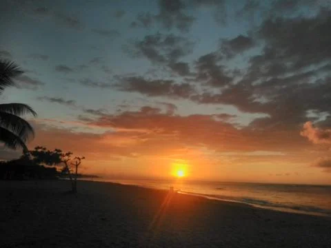 Sunset on the beach Stock Photos