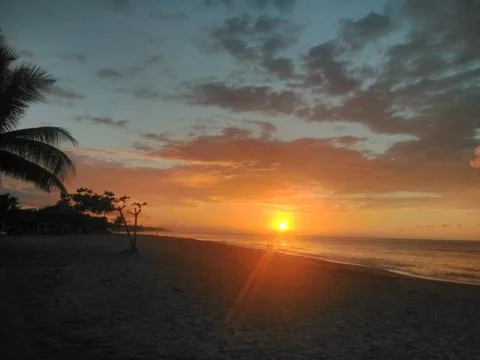 Sunset on the beach Stock Photos