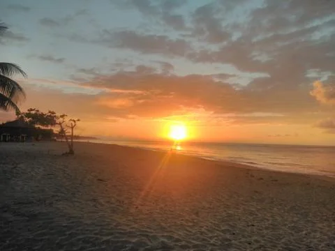Sunset on the beach Stock Photos