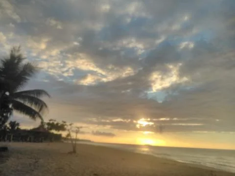Sunset on the beach Stock Photos