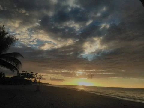 Sunset on the beach Stock Photos